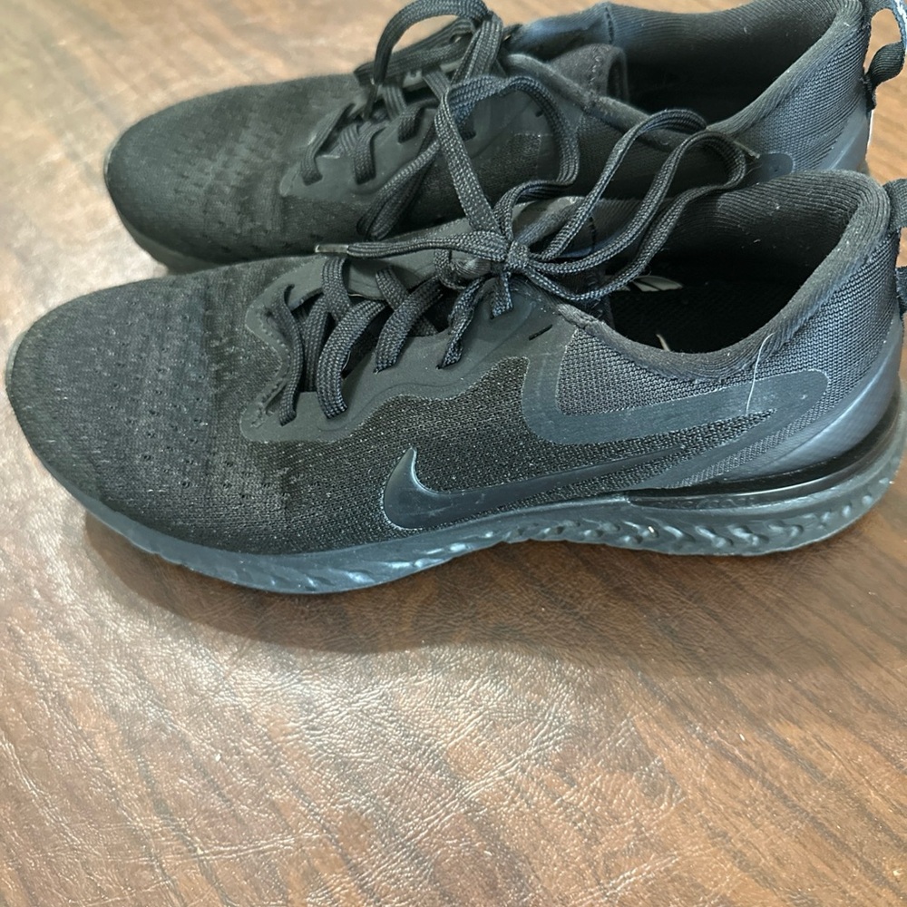 Nike Odyssey Women’s Triple Black Knit Lace-Up Sneakers